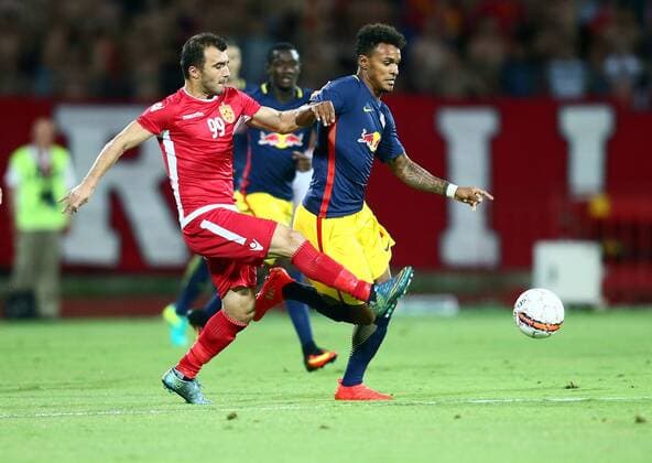 SOCCER - CL, quali, Tirana vs RBS ELBASAN,ALBANIA,26.JUL.16 - SOCCER - UEFA Champions League, qualification, FK Partizani Tirana vs Red Bull Salzburg. Image shows Renaldo Kalari (Tirana) and Valentino Lazaro (RBS). GEPAxpictures xFelixxRoittner