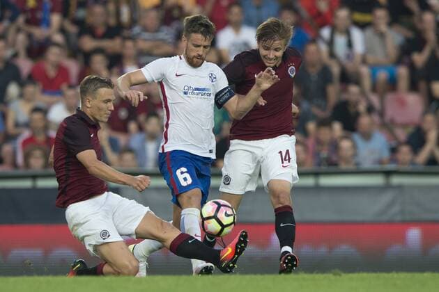 Borek Dockal of Sparta, from left, Mihai Pintilii of Steaua and Martin Frydek of Sparta in action during the 3rd qualifying round of football Champions League, 1st leg: Sparta Praha vs Steaua Bucharest in Prague, Czech Republic, July 26, 2016. (CTKxPhoto MichalxKamaryt) CTKPhotoP201607260925301  kmt 2