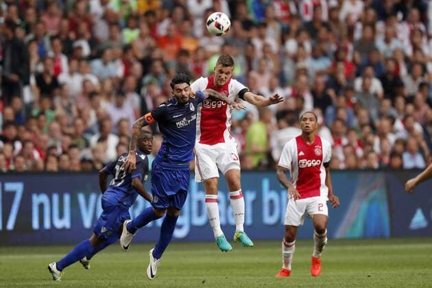 (L-R) Stefanos Athanasiadis of PAOK FC, Joel Veltman of Ajax during the UEFA Champions League Third qualifying round first leg match between Ajax Amsterdam and PAOK Saloniki on July 26, 2016 at the Amsterdam Arena in Amsterdam, The Netherlands. Ajax v PAOK Saloniki UEFA Champions League 2016 2017 xVIxxIVx 5898053