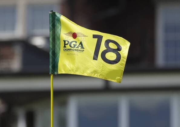 The Flag on the 18th green moves in the wind in a practice round at the PGA Golf Herren Championship at Baltusrol Golf Club in Springfield, New Jersey on July 26, 2016.  PGA20160726110 JOHNxANGELILLO