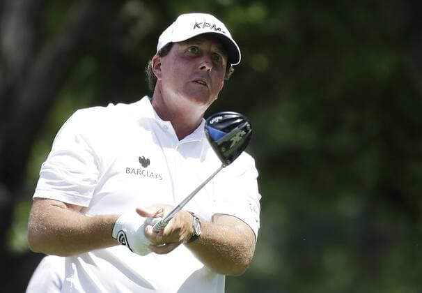 Phil Mickelson hits a tee shot in a practice round at the PGA Golf Herren Championship at Baltusrol Golf Club in Springfield, New Jersey on July 26, 2016.  PGA20160726116 JOHNxANGELILLO