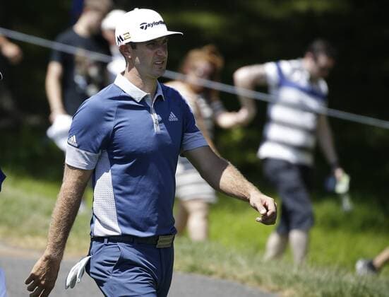 Dustin Johnson walks to play a ball at a practice round at the PGA Golf Herren Championship at Baltusrol Golf Club in Springfield, New Jersey on July 26, 2016.  PGA20160726122 JOHNxANGELILLO