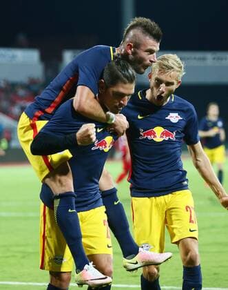 SOCCER - CL, quali, Tirana vs RBS ELBASAN,ALBANIA,26.JUL.16 - SOCCER - UEFA Champions League, qualification, FK Partizani Tirana vs Red Bull Salzburg. Image shows the rejoicing of Jonatan Soriano, Valon Berisha and Konrad Laimer (RBS). GEPAxpictures xFelixxRoittner