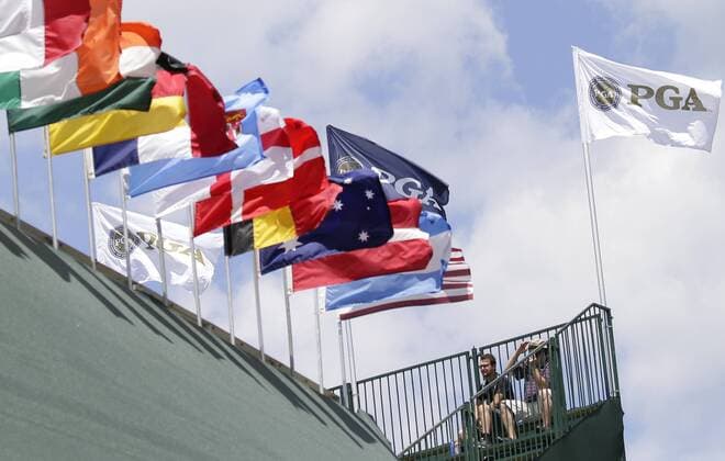 Fans sit in the empty stands to watch a practice round at the PGA Golf Herren Championship at Baltusrol Golf Club in Springfield, New Jersey on July 26, 2016.  PGA20160726111 JOHNxANGELILLO