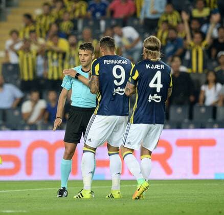 UEFA Champions League Third qualifying round first leg match between Fenerbahce Istanbul and Monaco on July 27, 2016 at the Ulker Stadium in Istanbul,Turkey. Pictured: Fernandao 9 , Simon Kjaer 4 of Fenerbahce and referee Jesus Gil Manzano. 