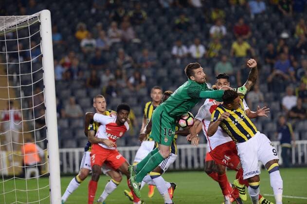 UEFA Champions League Third qualifying round first leg match between Fenerbahce Istanbul and Monaco on July 27, 2016 at the Ulker Stadium in Istanbul,Turkey. Final Score : Fenerbahce 2 - Monaco 1 Pictured: Jose Fernandao , Emmanuel Emenike of Fenerbahce and Goalkeeper Morgan de Sanctis of Monaco. 