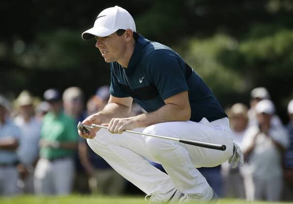 Rory McIlroy of Northern Ireland lines up a putt on the 15th hole in the first round at the PGA Golf Herren Championship at Baltusrol Golf Club in Springfield, New Jersey on July 28, 2016.  PGA20160728110 JOHNxANGELILLO