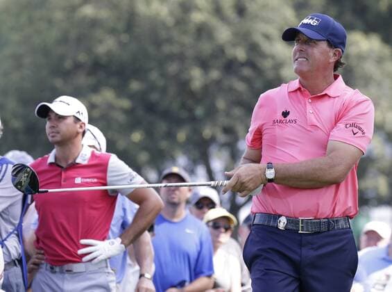 Phil Mickelson reacts after his tee shot on the 15th hole in the first round at the PGA Golf Herren Championship at Baltusrol Golf Club in Springfield, New Jersey on July 28, 2016.  PGA20160728113 JOHNxANGELILLO