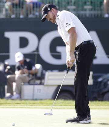Jimmy Walker putts on the 14th green in the first round at the PGA Golf Herren Championship at Baltusrol Golf Club in Springfield, New Jersey on July 28, 2016.  PGA20160728128 JOHNxANGELILLO
