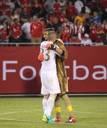 July 27, 2016 - Chicao, Illinois, U.S - AC Milan Goalkeeper DONNARUMMA GIANLUIGI (99) & Bayern Munich Defender TIM HAUBER (33)exchange a hug after the game at Soldier Field. SOCCER 2016: Penalties were needed to break a 3-3 draw between Bayern Munich and AC Milan Wednesday July 27, 2016 at Soldier Field in Chicago, Illinois. AC Milan won the shootout 5-3. - ZUMAl136