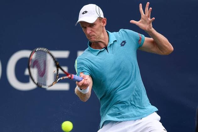 July 28, 2016: Kevin Anderson of South Africa returns the ball to Bernard Tomic of Australia during their third round match of the Rogers Cup tournament at the Aviva Centre in Toronto, Ontario, Canada on July 28, 2016. Cal Media TENNIS 2016 - Rogers Cup Toronto July 28 - ZUMAc04_