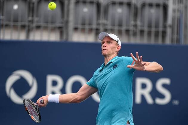 July 28, 2016: Kevin Anderson of South Africa returns the ball to Bernard Tomic of Australia during their third round match of the Rogers Cup tournament at the Aviva Centre in Toronto, Ontario, Canada on July 28, 2016. Cal Media TENNIS 2016 - Rogers Cup Toronto July 28 - ZUMAc04_