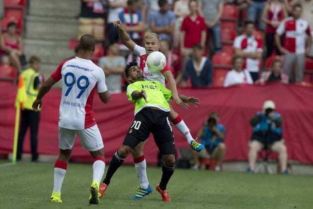 From left: Gino van Kessel from Slavia, Ruben Ribeiro from Rio and Jan Mikula from Slavia in action during the Football Europa League 3rd qualifying round match SK Slavia Praha vs Rio Ave, in Prague, Czech Republic, July 28, 2016. (CTKxPhoto MichalxKamaryt) CTKPhotoP201607280924101  kmt 3