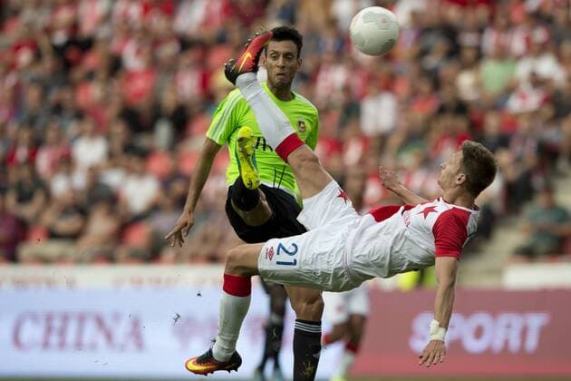 From front: Milan Skoda from Slavia and Roderick Miranda from Rio in action during the Football Europa League 3rd qualifying round match SK Slavia Praha vs Rio Ave, in Prague, Czech Republic, July 28, 2016. (CTKxPhoto MichalxKamaryt) CTKPhotoP201607280943101  kmt 6