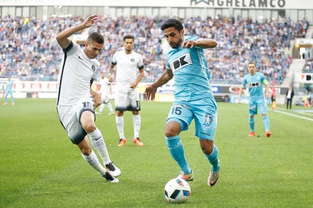 Viitorul s Razvan Marin and Gent s Kenneth Saief fight for the ball during the first leg match of the third qualifying round between Belgian first league soccer team KAA Gent and Romania s FC Viitorul Constanta in the Europa League competition, on Thursday 28 July 2016, in Gent. BRUNOxFAHY  x04899740x