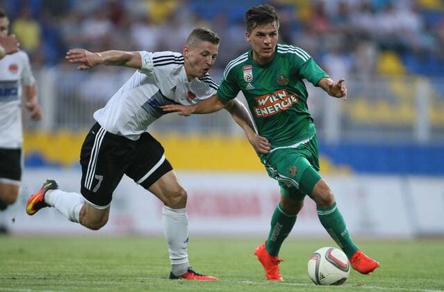 SOCCER - EL quali, Zhodino vs Rapid ZHODZINA,BELARUS,28.JUL.16 - SOCCER - UEFA Europa League, qualification, FC Torpedo Zhodino vs SK Rapid Wien. Image shows Sergiy Shapoval (Schodsina) and Thomas Murg (Rapid). Keywords: Wien Energie. GEPAxpictures xMarioxKneisl