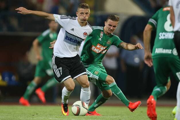 SOCCER - EL quali, Zhodino vs Rapid ZHODZINA,BELARUS,28.JUL.16 - SOCCER - UEFA Europa League, qualification, FC Torpedo Zhodino vs SK Rapid Wien. Image shows Sergiy Shapoval (Schodsina) and Mario Pavelic (Rapid). Keywords: Wien Energie. GEPAxpictures xMarioxKneisl