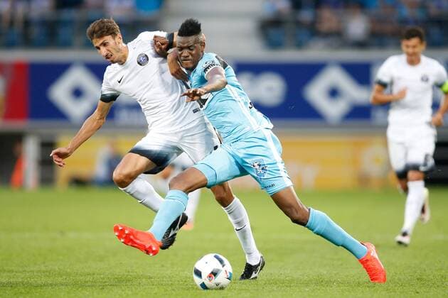 Viitorul s Ioan Filip and Gent s Kalifa Coulibaly fight for the ball during the first leg match of the third qualifying round between Belgian first league soccer team KAA Gent and Romania s FC Viitorul Constanta in the Europa League competition, on Thursday 28 July 2016, in Gent. BRUNOxFAHY  x04899921x