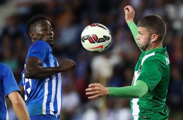 Genk s Wilfried Ndidi and Cork s Danny Morrissey fight for the ball during the first leg game of the third qualifying round between Belgian first league soccer team KRC Genk and Ireland s Cork City F.C. in the Europa League competition, on Thursday 28 July 2016, in Genk. VIRGINIExLEFOUR  x04899935x