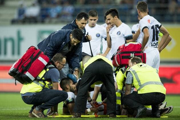 Viitorul s Bogdan Tiru lies injured on the ground during the first leg match of the third qualifying round between Belgian first league soccer team KAA Gent and Romania s FC Viitorul Constanta in the Europa League competition, on Thursday 28 July 2016, in Gent. JASPERxJACOBS  x04900014x