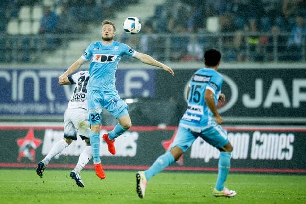 Viitorul s Florin Purece and Gent s Lasse Nielsen fight for the ball during the first leg match of the third qualifying round between Belgian first league soccer team KAA Gent and Romania s FC Viitorul Constanta in the Europa League competition, on Thursday 28 July 2016, in Gent. JASPERxJACOBS  x04900043x