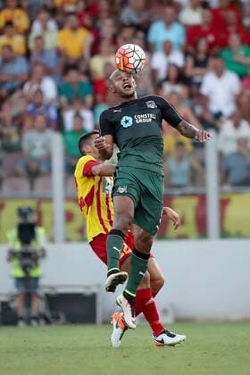 28 07 2016 Hibernians Stadium, Paola, Malta UEFA Europa League Third Qualifying Round, First Leg Birkirkara FC (Malta) v FC Krasnodar (Russia) Da Silva Ferreira Ariclenes of FC Krasnodar (in green) and Christian Bubalovic of Birkirkara FC (in yellow and red kit) during the UEFA Europa League, third qualifying round, first leg match between Birkirkar and Krasnodar of Russia. Birkirkara FC v Krasnodar - UEFA Europa League 2016 17 BKR_KRA_UEL_16_17
