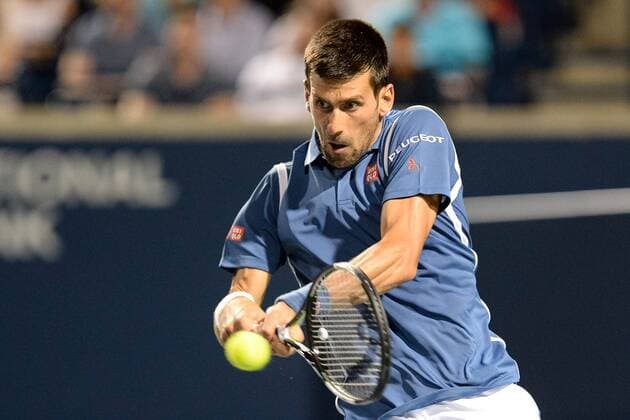 July 28, 2016: Novak Djokovic of Serbia & Montenegro returns the ball to Radek Stepanek of Czech Republic during their third round match of the Rogers Cup tournament at the Aviva Centre in Toronto, Ontario, Canada on July 28, 2016. Cal Media TENNIS 2016 - Rogers Cup Toronto July 28 - ZUMAc04_