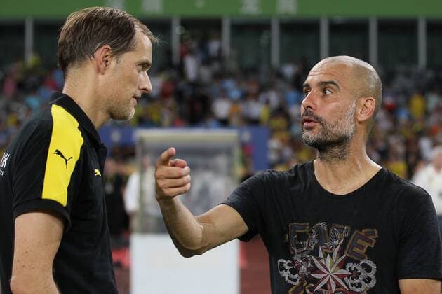 Head coach Pep Guardiola of Manchester City, right, talks to head coach Thomas Tuchel of Borussia Dortmund before the penalty shootout of the Shenzhen match of the 2016 International Champions Cup China in Shenzhen city, south China s Guangdong province, 28 July 2016. Pep Guardiola got his first taste of victory as Manchester City s manager Thursday (28 July 2016) night after beating Borussia Dortmund on penalties in a friendly, but expressed concern about the looming English Premier League season. Football today is tough, said Guardiola, whose side beat their German opposition in the southern Chinese city of Shenzhen. City won, and finally got the workout Guardiola had craved, thanks to a 6-5 penalty shootout win over Dortmund, after the game ended one apiece. City keeper Angus Gunn was the hero of penalties with three saves, including the one sealing their victory when he palmed away Mikel Merino s attempt. Manchester City beat Dortmund on penalties in Shenzhen 20160728_65262