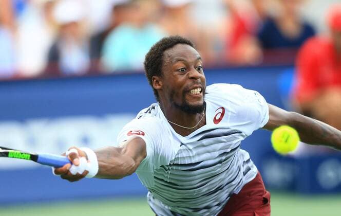 (160729) -- TORONTO, July 29, 2016 -- Gael Monfils of France returns the ball against David Goffin of Belgium during their third round of men s singles match at the 2016 Rogers Cup in Toronto, Canada, July 28, 2016. Gael Monfils won 2-1. )(hcs) (SP)CANADA-TORONTO-TENNIS-ROGERS CUP-MEN S SINGLES ZouxZheng 