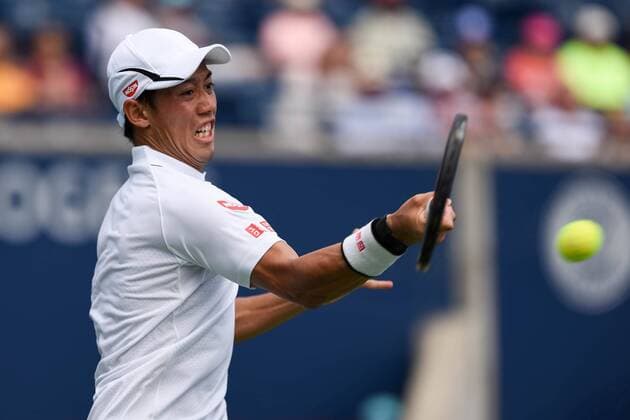 July 29, 2016: Kei Nishikori of Japan returns the ball to Grigor Dimitrov of Bulgaria during their quarter finals match of the Rogers Cup tournament at the Aviva Centre in Toronto, Ontario, Canada on July 29, 2016. Cal Media TENNIS 2016 - Rogers Cup Toronto July 29 - ZUMAc04_