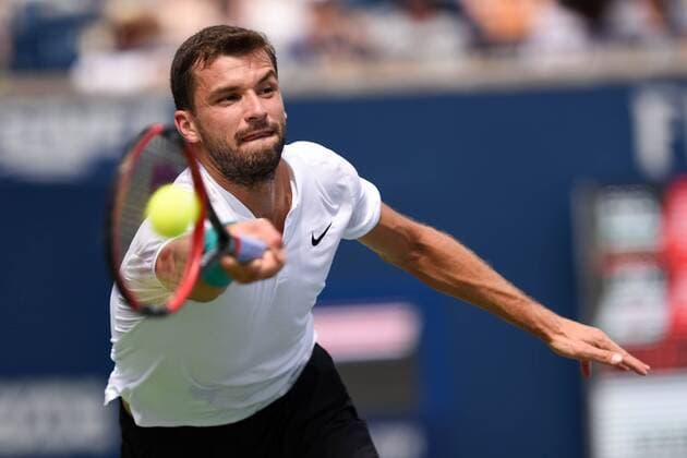 July 29, 2016: Grigor Dimitrov of Bulgaria returns the ball to Kei Nishikori of Japan during their quarter finals match of the Rogers Cup tournament at the Aviva Centre in Toronto, Ontario, Canada on July 29, 2016. Cal Media TENNIS 2016 - Rogers Cup Toronto July 29 - ZUMAc04_