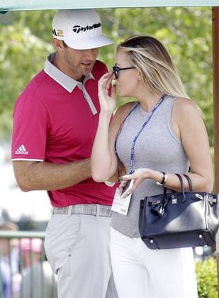Dustin Johnson stands with wife Paulina Gretzky after his completing his second round at the PGA Golf Herren Championship at Baltusrol Golf Club in Springfield, New Jersey on July 29, 2016.  PGA20160729123 JOHNxANGELILLO