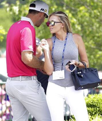 Dustin Johnson stands with wife Paulina Gretzky after his completing his second round at the PGA Golf Herren Championship at Baltusrol Golf Club in Springfield, New Jersey on July 29, 2016.  PGA20160729124 JOHNxANGELILLO