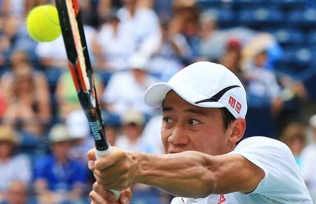 (160729) -- TORONTO, July 29, 2016 -- Kei Nishikori of Japan returns the ball against Grigor Dimitrov of Bulgaria during their quarterfinal match of men s singles at the 2016 Rogers Cup in Toronto, Canada, July 29, 2016. Kei Nishikori won 2-1. ) (xr) (SP)CANADA-TORONTO-TENNIS-ROGERS CUP-MEN S SINGLES ZouxZheng 