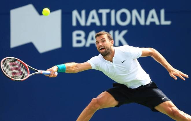 (160729) -- TORONTO, July 29, 2016 -- Grigor Dimitrov of Bulgaria returns the ball against Kei Nishikori of Japan during their quarterfinal match of men s singles at the 2016 Rogers Cup in Toronto, Canada, July 29, 2016. Grigor Dimitrov lost 1-2. ) (xr) (SP)CANADA-TORONTO-TENNIS-ROGERS CUP-MEN S SINGLES ZouxZheng 