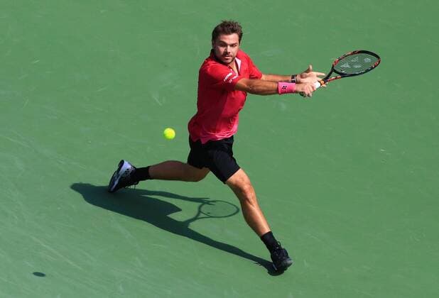 (160731) -- TORONTO, July 30, 2016 -- Stan Wawrinka of Switzerland returns the ball against Kei Nishikori of Japan during their semifinal match of men s singles at the 2016 Rogers Cup in Toronto, Canada, July 30, 2016. Stan Wawrinka lost 0-2. ) (SP)CANADA-TORONTO-TENNIS-ROGERS CUP-MEN S SINGLES ZouxZheng 