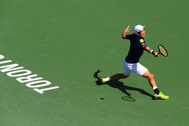 (160731) -- TORONTO, July 30, 2016 -- Kei Nishikori of Japan returns the ball against Stan Wawrinka of Switzerland during their semifinal match of men s singles at the 2016 Rogers Cup in Toronto, Canada, July 30, 2016. Kei Nishikori won 2-0. ) (SP)CANADA-TORONTO-TENNIS-ROGERS CUP-MEN S SINGLES ZouxZheng 