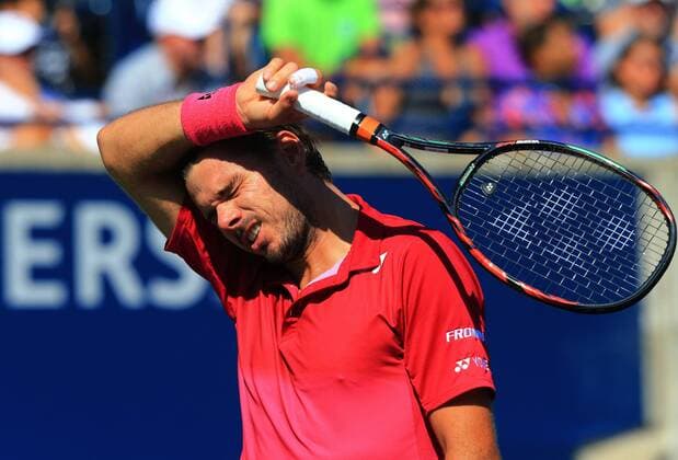 (160731) -- TORONTO, July 30, 2016 -- Stan Wawrinka of Switzerland reacts during the semifinal match of men s singles against Kei Nishikori of Japan at the 2016 Rogers Cup in Toronto, Canada, July 30, 2016. Stan Wawrinka lost 0-2. ) (SP)CANADA-TORONTO-TENNIS-ROGERS CUP-MEN S SINGLES ZouxZheng 