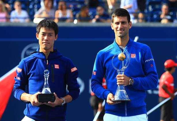 (160801) -- TORONTO, Aug. 1, 2016 -- Kei Nishikori(L) of Japan and Novak Djokovic of Serbia pose for photos during the awarding ceremony of the final match of men s singles at the 2016 Rogers Cup in Toronto, Canada, July 31, 2016. Kei Nishikori lost to Novak Djokovic of Serbia 0-2. ) (SP)CANADA-TORONTO-TENNIS-ROGERS CUP-MEN S SINGLES-FINAL ZouxZheng 