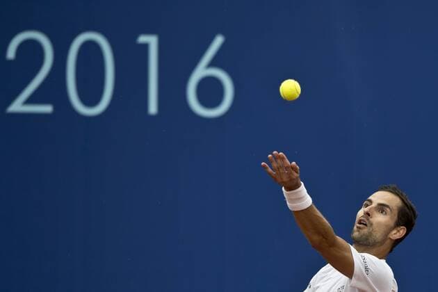 Colombian Santiago Giraldo plays against Uladzimir Ignatik during the men s challenger final of Advantage Cars Prague Open 2016 tennis tournament in Prague, Czech Republic, July 31, 2016. (CTKxPhoto MichalxKamaryt) CTKPhotoP201607310236901  kmt 3