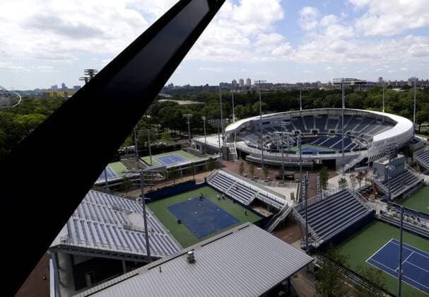 Construction around the grounds of the USTA Billie Jean King National Tennis Center takes place as an official USTA unveiling ceremony takes place in Arthur Ashe Stadium for the US Open Tennis Championships at the in New York City on August 2, 2016. The retractable roof was completed in time for the 2016 US Open tournament.  NYP20160802109 JOHNxANGELILLO