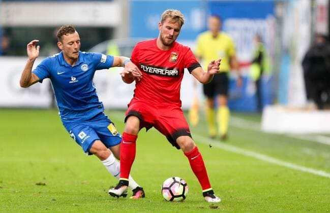 SOCCER - UEFA EL quali, Liberec vs Admira LIBEREC,CZECH REPUBLIC,03.AUG.16 - SOCCER - UEFA Europa League, qualification, Slovan Liberec vs FC Admira Wacker Moedling. Image shows Vladimir Coufal (Liberec) and Lukas Grozurek (Admira). GEPAxpictures xPhilippxBrem