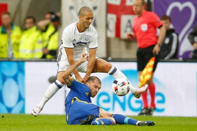 Anderlecht s Sofiane Hanni and Rostov s Timofei Kalachev fight for the ball during the return leg of the third qualification round for the Champions League competition between Belgian first league soccer team RSC Anderlecht and Russian team FC Rostov in Brussels, Wednesday 03 August 2016. The first leg ended in a 2-2 draw. BRUNOxFAHY  x04902905x