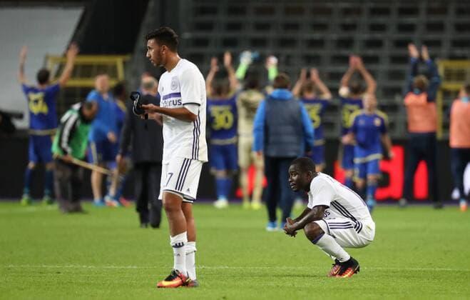Anderlecht s Mahmoud Trezeguet Hassan and Anderlecht s Frank Acheampong look dejected after the return leg of the third qualification round for the Champions League competition between Belgian first league soccer team RSC Anderlecht and Russian team FC Rostov in Brussels, Wednesday 03 August 2016. The first leg ended in a 2-2 draw. VIRGINIExLEFOUR  x04903149x