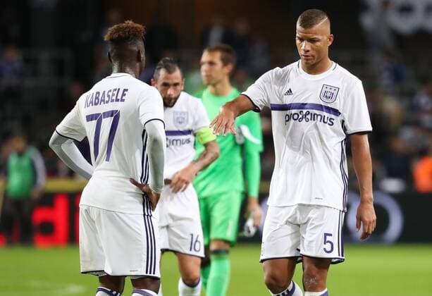 Anderlecht s Nathan Kabasale and Anderlecht s Sebastien De Maio look dejected after the return leg of the third qualification round for the Champions League competition between Belgian first league soccer team RSC Anderlecht and Russian team FC Rostov in Brussels, Wednesday 03 August 2016. The first leg ended in a 2-2 draw. VIRGINIExLEFOUR  x04903150x