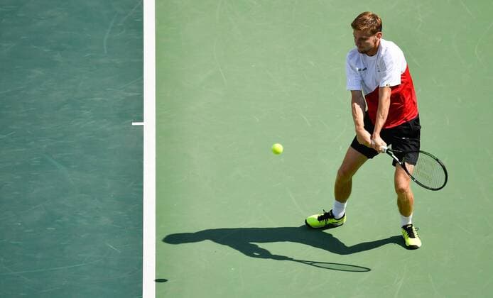 Belgian tennis player David Goffin plays a backhand during a training session of Team Belgium s tennis players ahead of the start of the 2016 Olympic Games Olympische Spiele Olympia OS in Rio, Brazil, Thursday 04 August 2016. ERICxLALMAND  x04903447x