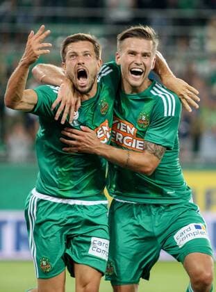 SOCCER - EL quali, Rapid vs Zhodino VIENNA,AUSTRIA,04.AUG.16 - SOCCER - UEFA Europa League, qualification, SK Rapid Wien vs FC Torpedo Zhodino. Image shows the rejoicing of Thomas Schrammel and Arnor Ingvi Traustason (Rapid). Keywords: Wien Energie. GEPAxpictures xMarioxKneisl