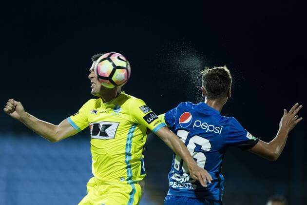 Gent s Jeremy Perbet and Viitorul s Dragos Nedelcu fight for the ball during a soccer game between Romania s FC Viitorul Constanta and Belgium s KAA Gent, Thursday 04 August 2016, in Ovidiu, Romania, the return leg of the third qualifying round in the Europa League competition. The first leg ended in a 5-0 Gent victory. JASPERxJACOBS  x04903628x