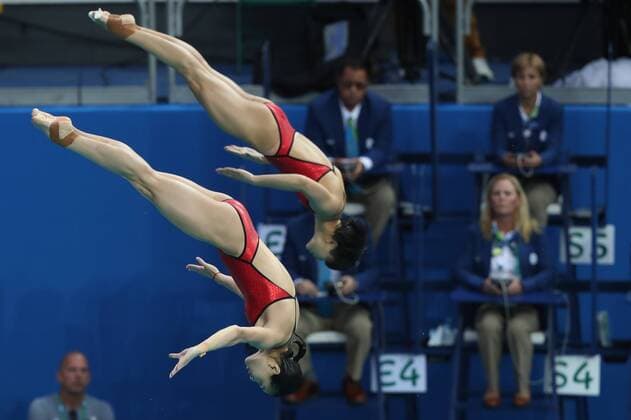 Olympics 2016 Diving RIO DE JANEIRO, RJ - 07.08.2016: OLYMPICS 2016 DIVING - Chinese Tingmao Shi (CHN) and Minxia Wu (CHN) won the gold medal in the synchronized 3m trampulim during the Olympics Diving 2016 held in the Maria Lenk Aquatic Center. NOT AVAILABLE FOR LICENSING IN CHINA (Photo: Junior Lago Fotoarena) x1173967x  JuniorxLago