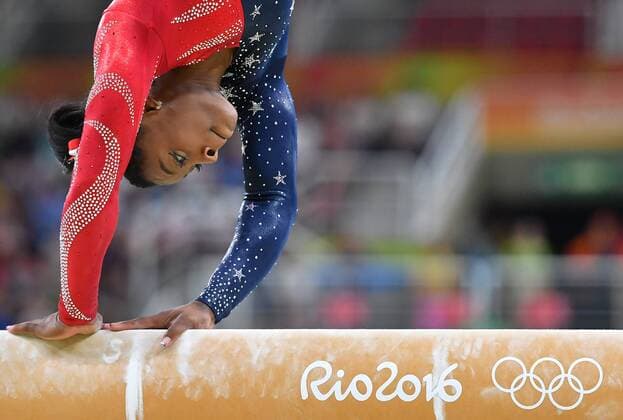 American gymnast Simone Biles competes in the balance beam qualifications at the 2016 Rio Summer Olympics in Rio de Janeiro, Brazil, August 6, 2016.  OLY20160807369 KEVINxDIETSCH